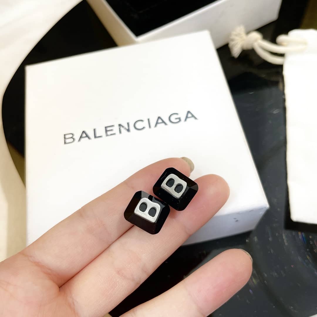 Ba1en*iaga Earring Dupes Logo