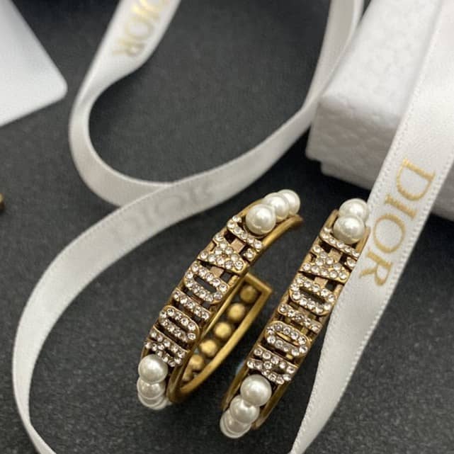 7 Star Chr1st1an D10r Earring