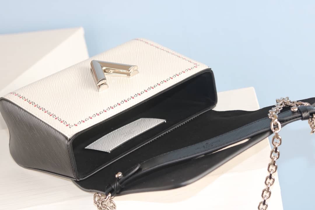 L0vis Vvtt0n Textured Epi Leather Twist Series Bag White