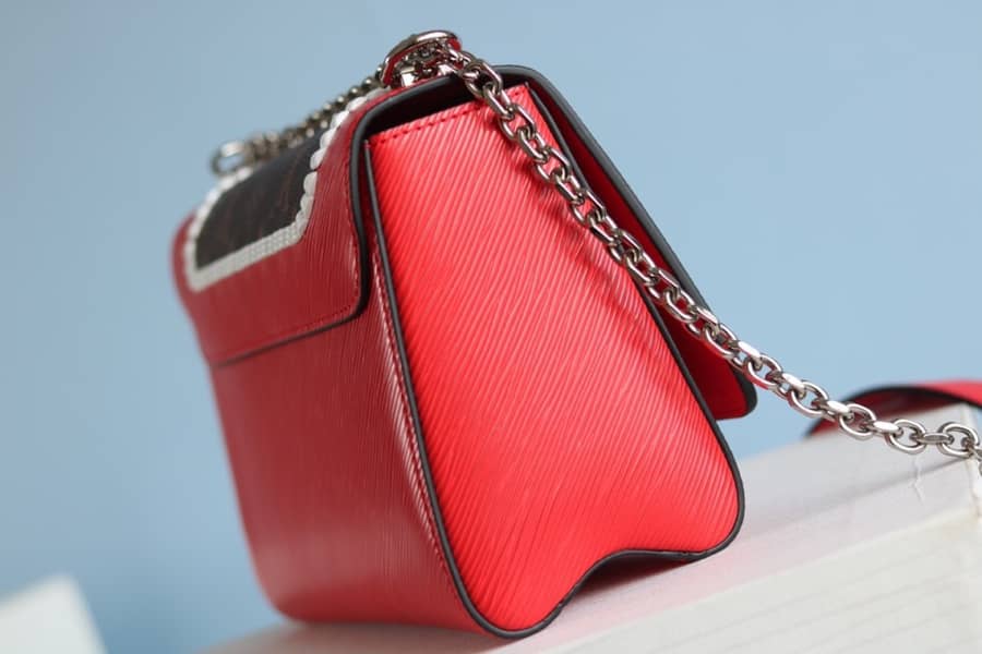 L0vis Vvtt0n Textured Epi Leather Twist Series Bag