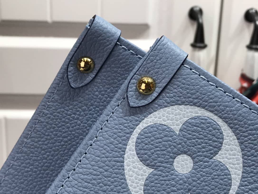 L0vis Vvtt0n On the Go MM Monogram Empreinte Two-way Tote Replica Blue M45717