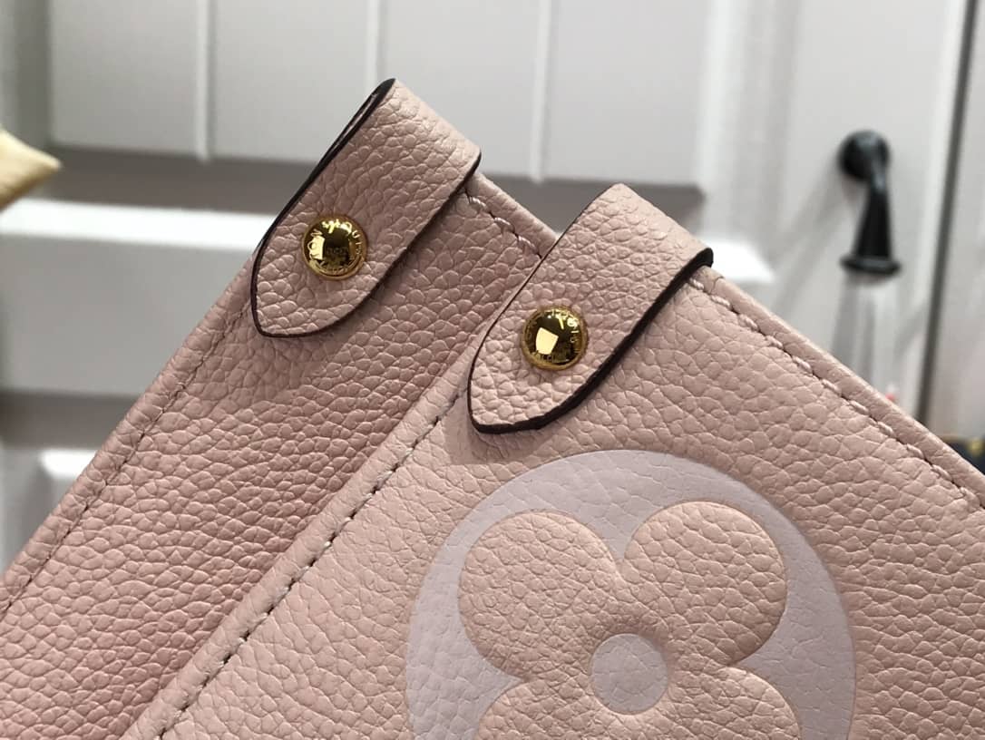 L0vis Vvtt0n On the Go MM Monogram Empreinte Two-way Tote Replica Pink M45717