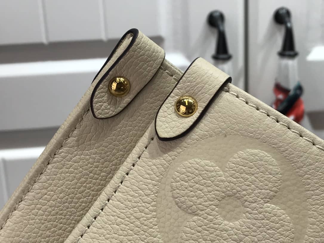 L0vis Vvtt0n On the Go MM Monogram Empreinte Two-way Tote Replica Apricot M45717