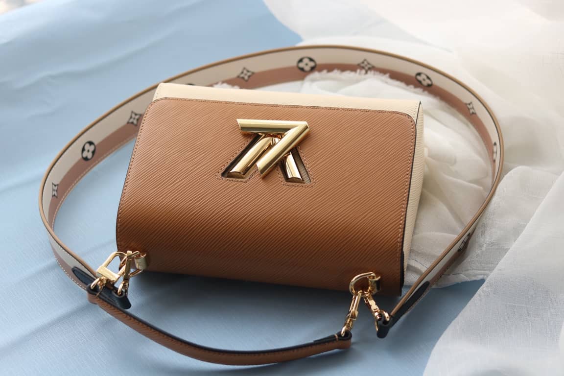L0vis Vvtt0n Textured Epi Leather Twist Series Bag Brown