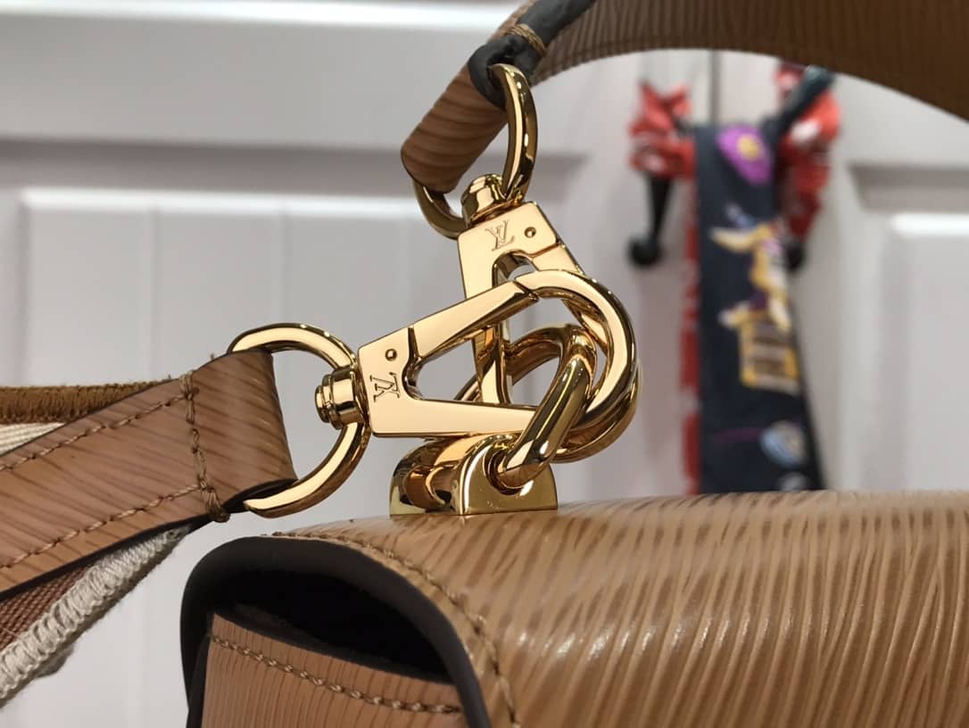 L0vis Vvtt0n Twist MM Golden Lock Handle Epi Leather Replica Crossbody Bag M57506