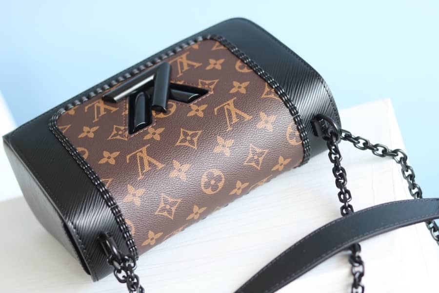 L0vis Vvtt0n Textured Epi Leather Twist Series Bag