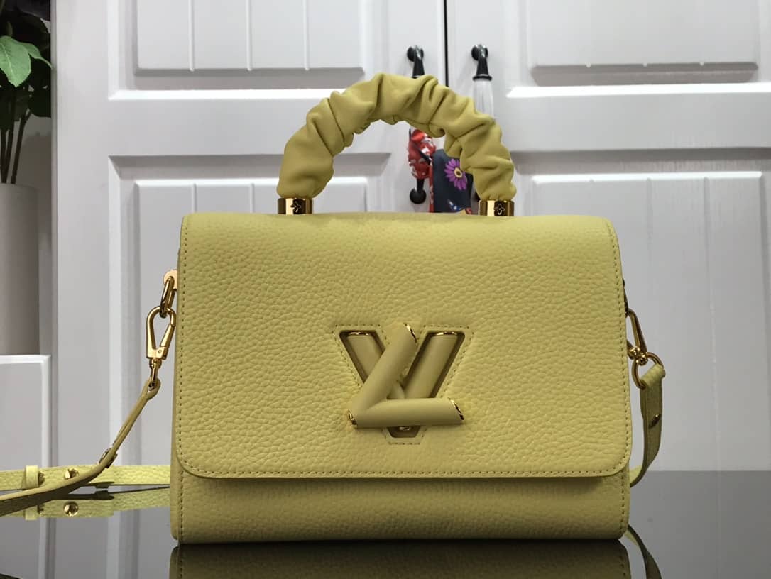 L0vis Vvtt0n Replica Bags Twist PM Pondichery Taurillon Leather Replica Bag Yellow M58691