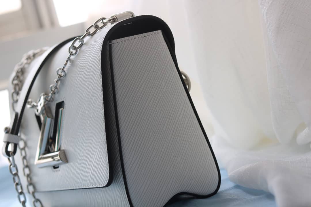 L0vis Vvtt0n Textured Epi Leather Twist Series Bag