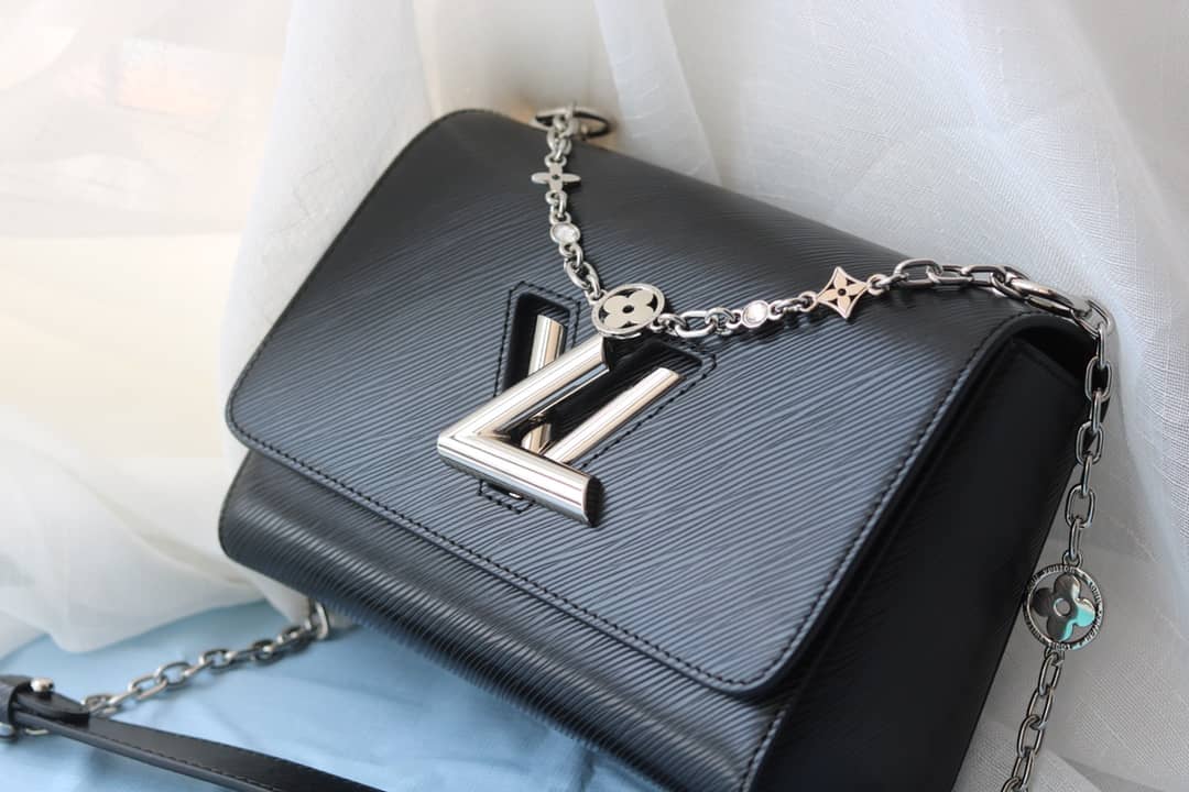 L0vis Vvtt0n Textured Epi Leather Twist Series Bag