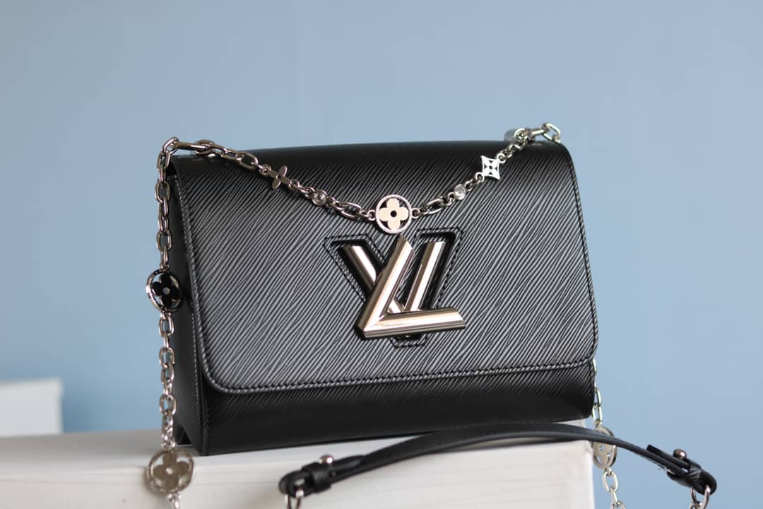L0vis Vvtt0n Textured Epi Leather Twist Series Bag