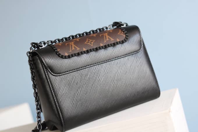 L0vis Vvtt0n Textured Epi Leather Twist Series Bag