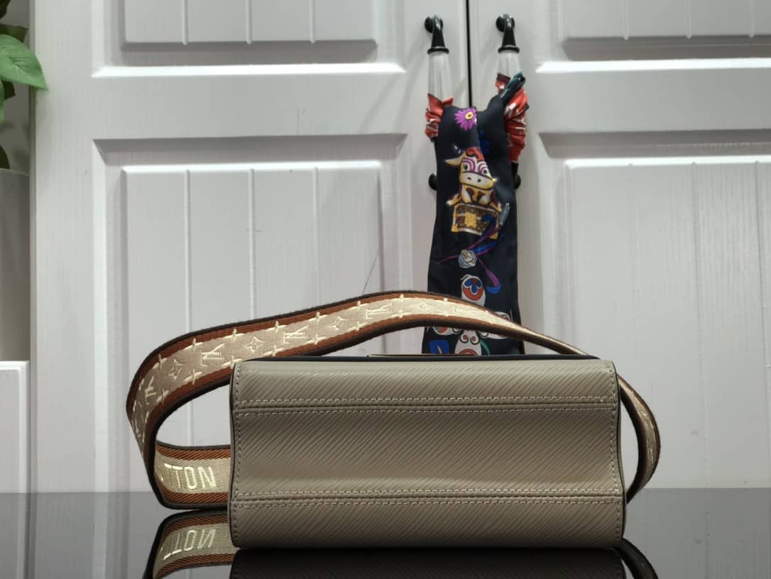 L0vis Vvtt0n Epi leather Twist PM Replica Handbag M57049