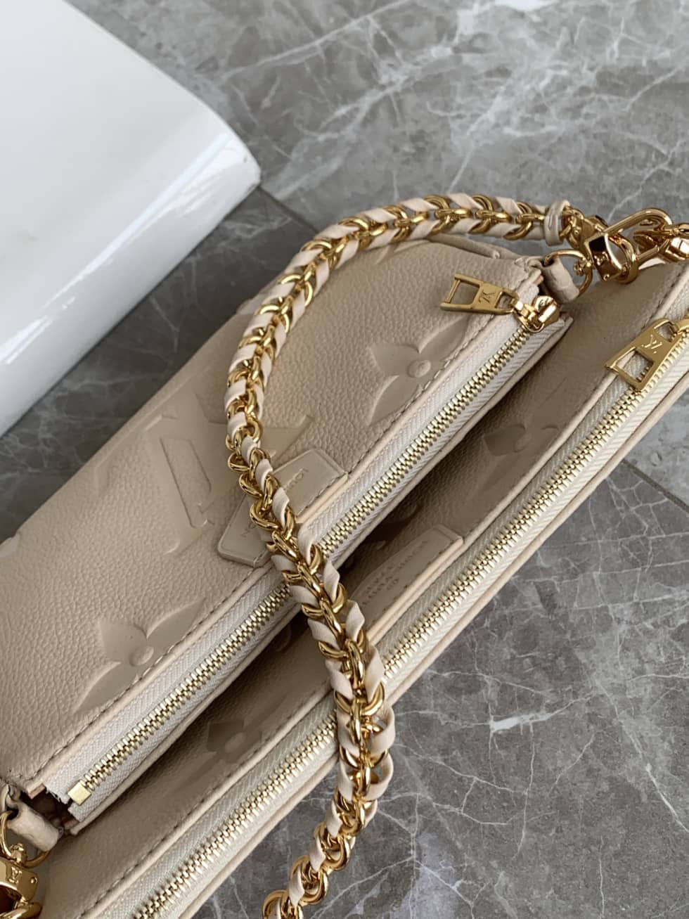 L0vis Vvtt0n Monogram Empreinte Multi Pochette Accessoires M80447 Replica