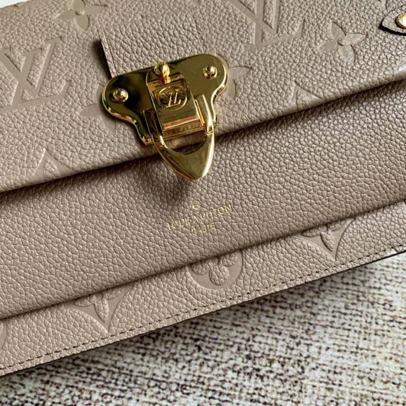 L0vis Vvtt0n Monogram Empreinte Vavin Chain Long Wallet Replica Apricot M67839