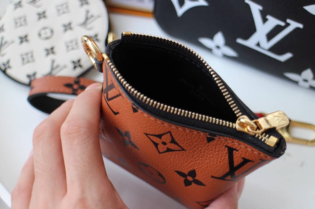 L0vis Vvtt0n Crafty Trio Pouch Monogram Empreinte Replica M69516