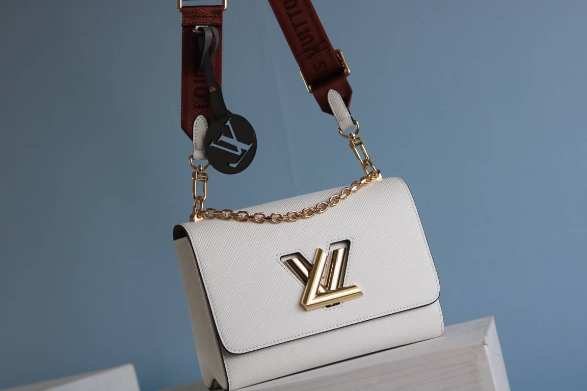 L0vis Vvtt0n Textured Epi Leather Twist Series Bag