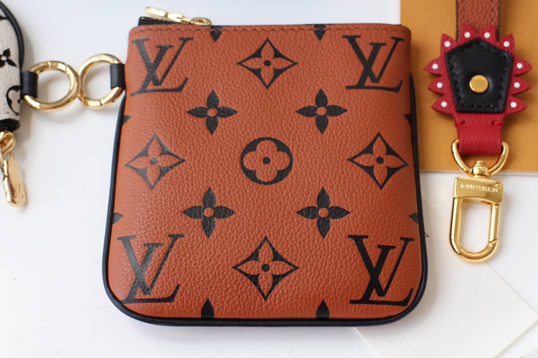 L0vis Vvtt0n Crafty Trio Pouch Monogram Empreinte Replica M69516