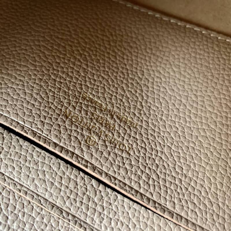L0vis Vvtt0n Pochette Melanie MM Monogram Empreinte Replica Clutch Apricot M68705