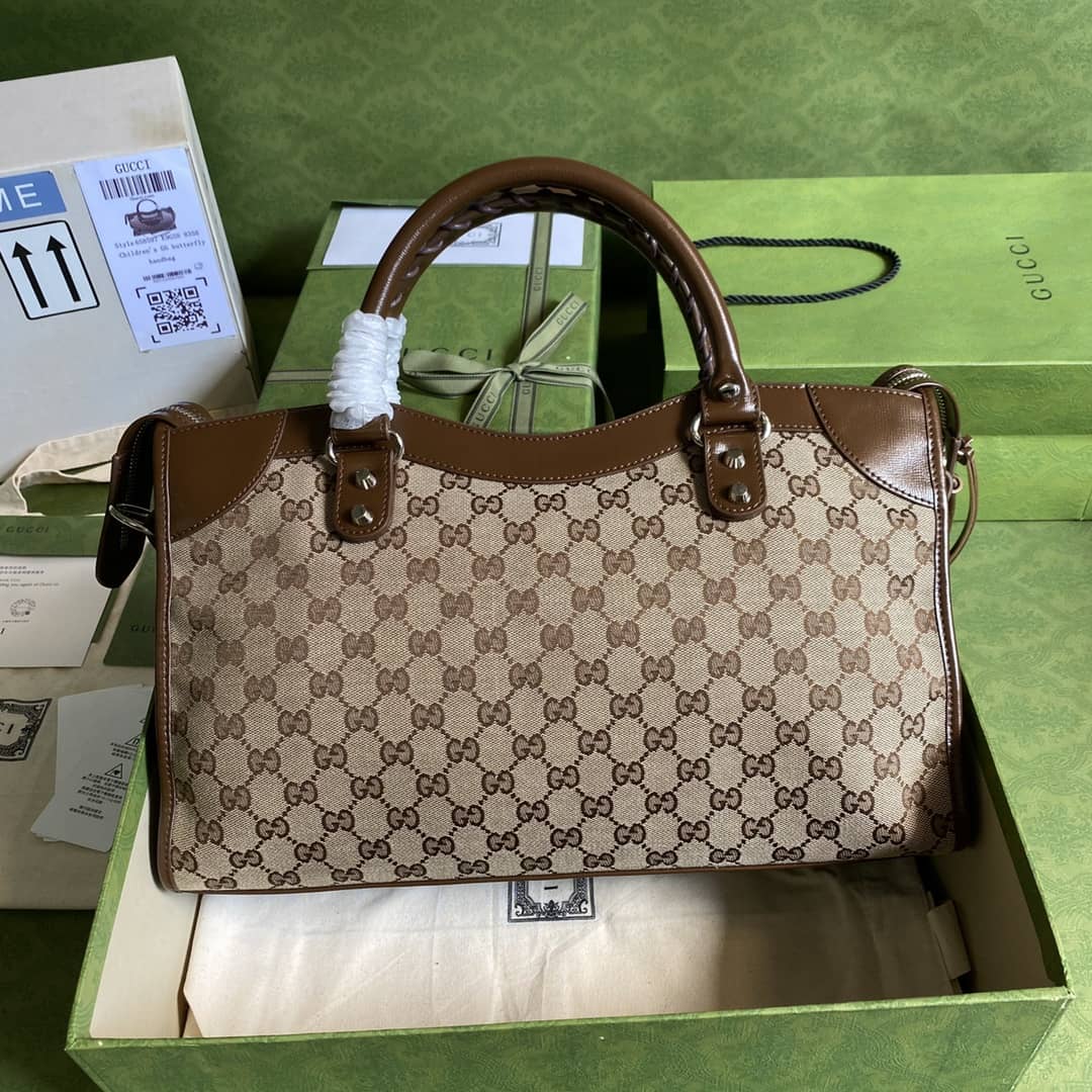 Gvc*1 x Ba1en*iaga GG Canvas City Bag Replica 658597