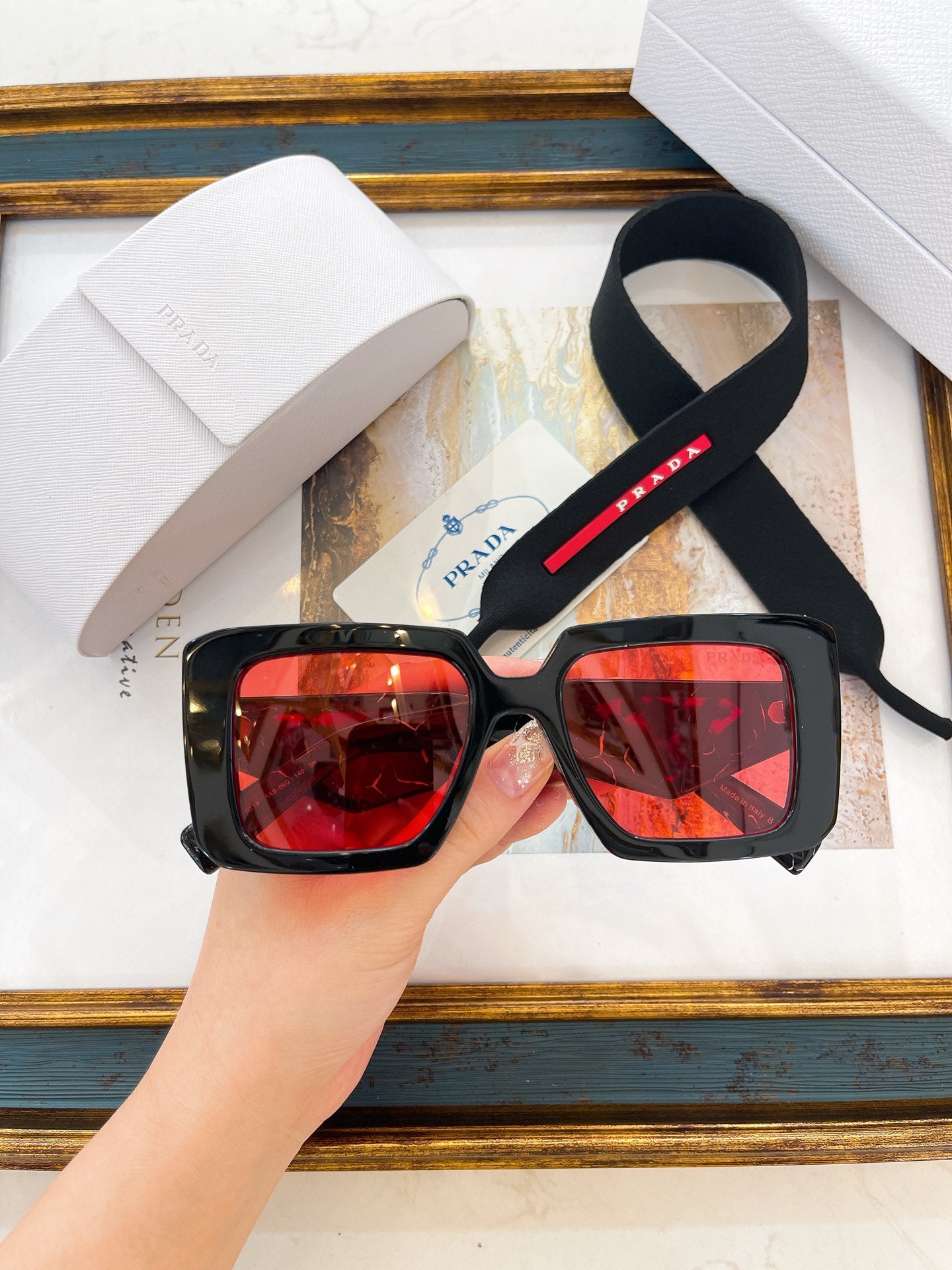 Pra*a Sunglasses