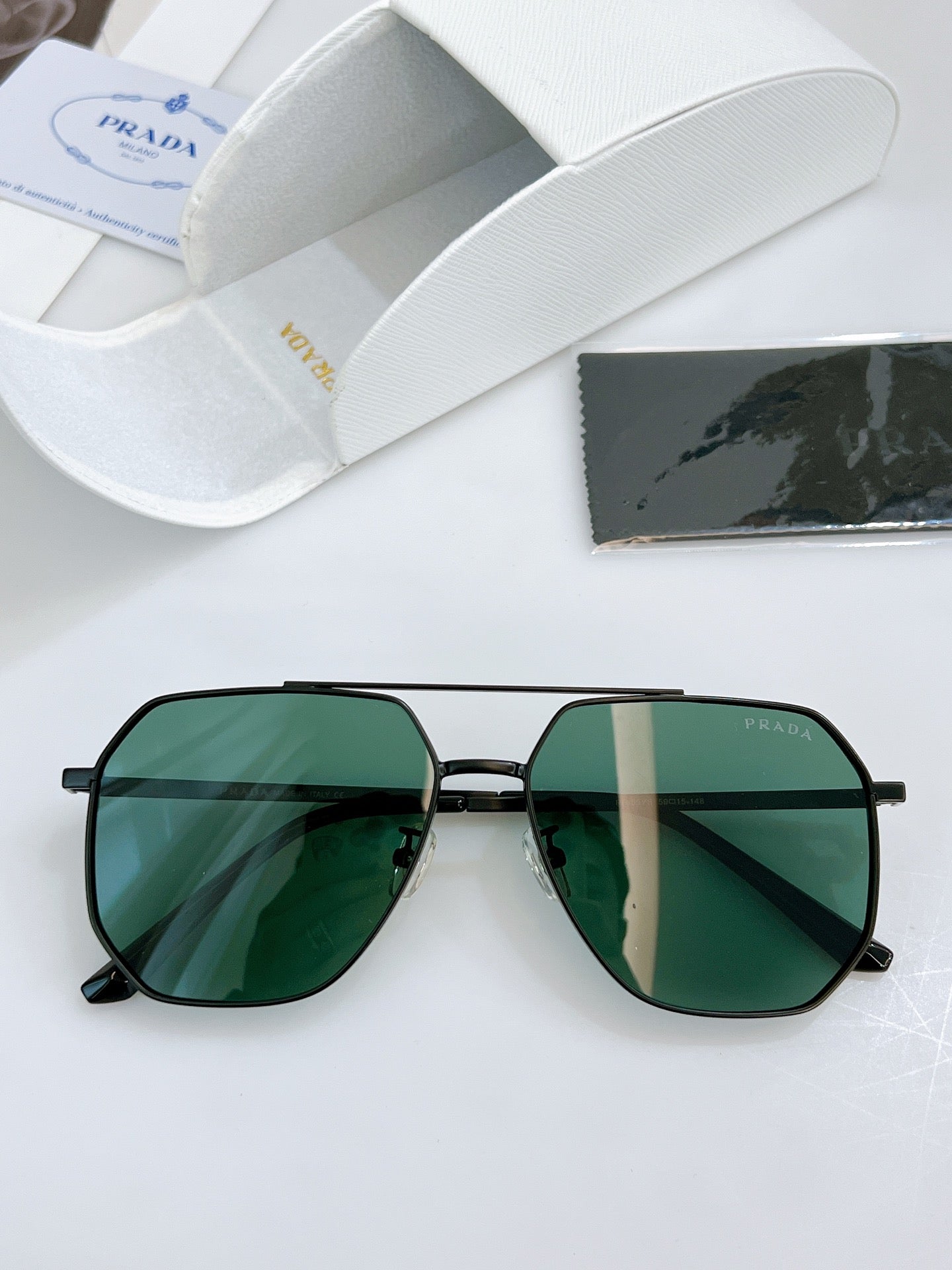 Pra*a Sunglasses
