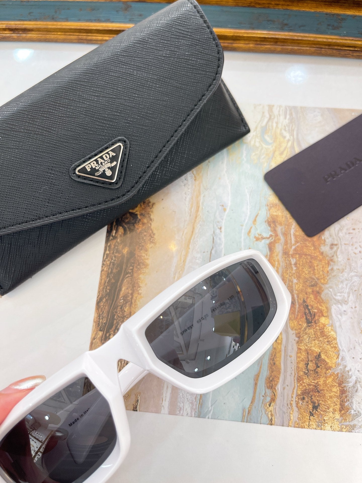 Pra*a Sunglasses